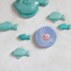 flor petunia y peces